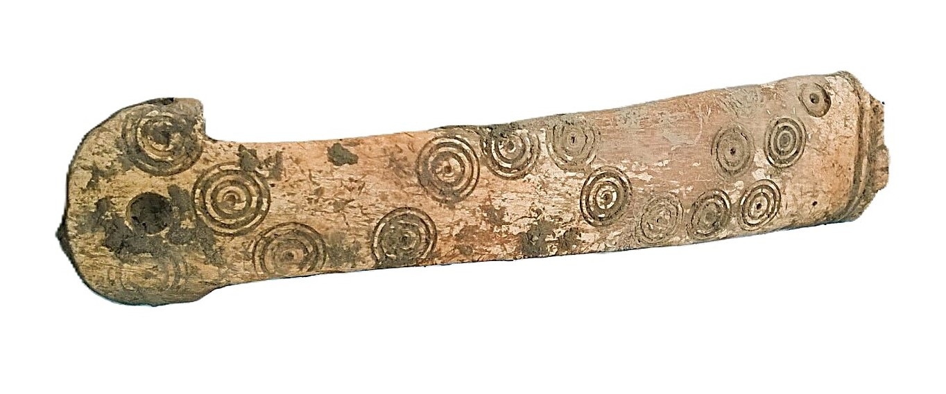 Bone weaving comb